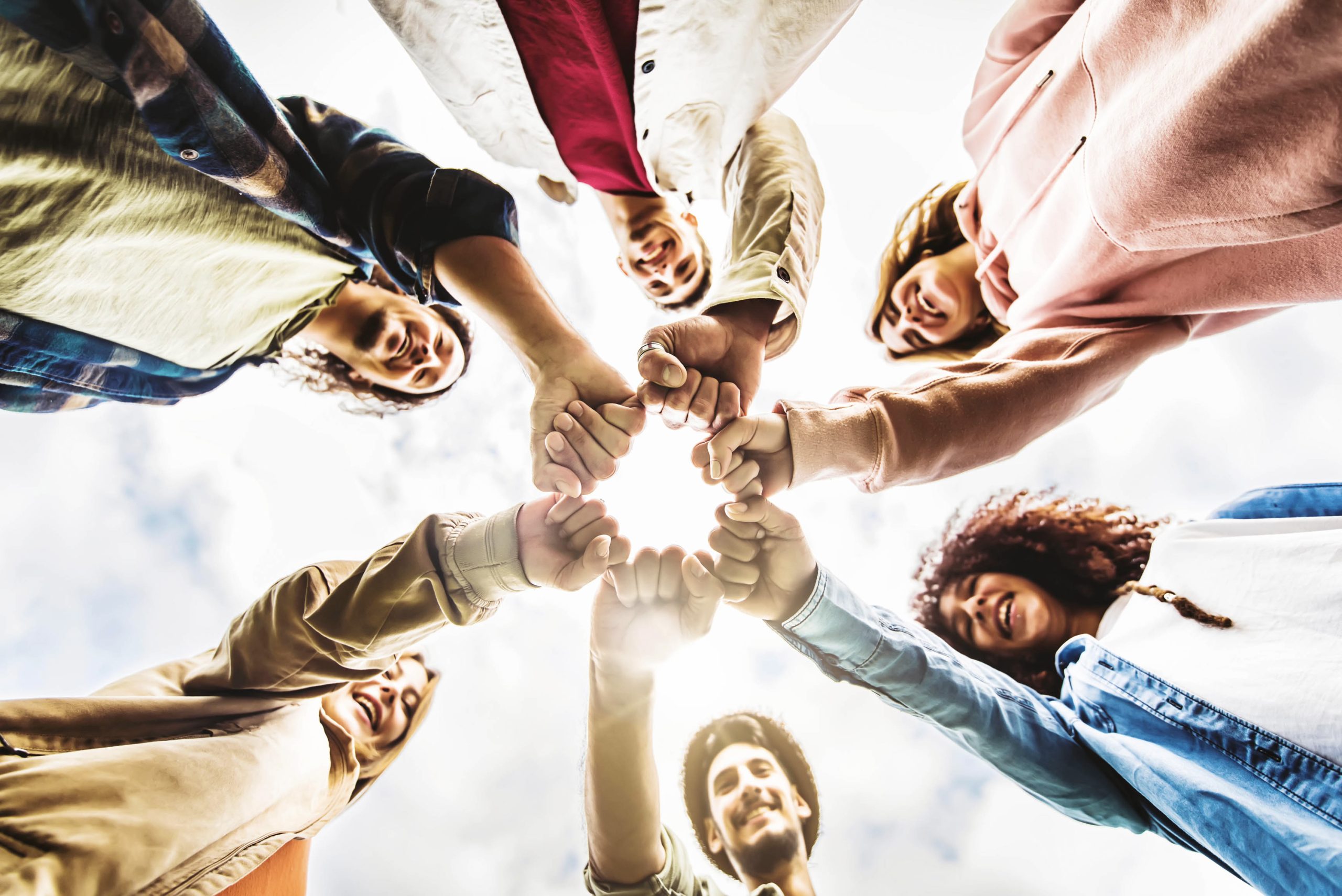 multiracial_group_of_young_people_making_fist_bump_2023_03_15_011